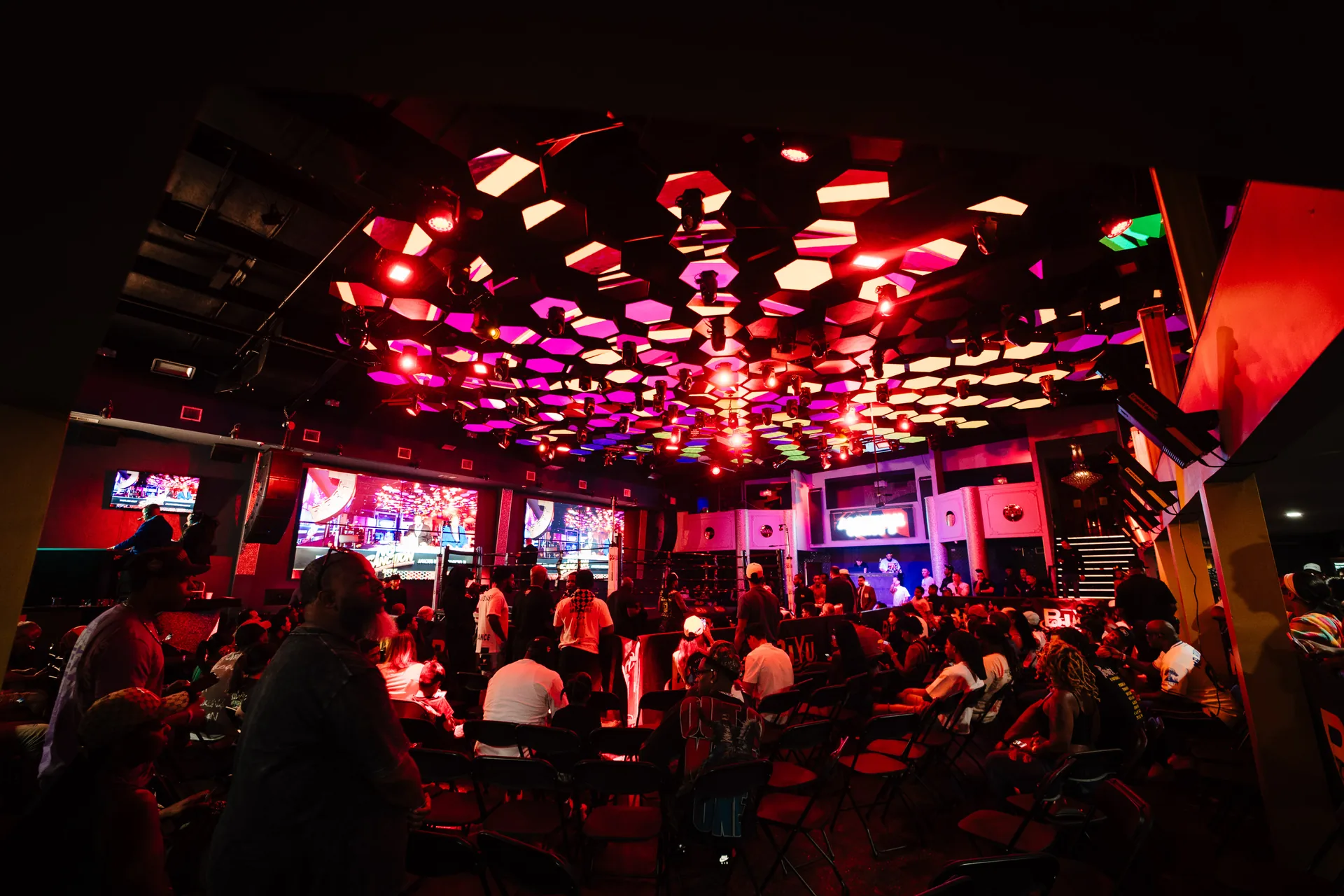 BIYU Arena crowd under the red LED ceiling